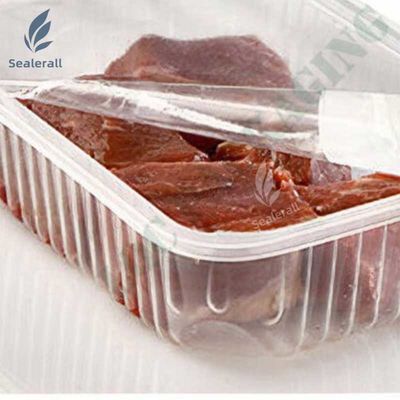 comprare Macchina elettrica di sigillamento automatico del vassoio di carne di maiale cotta fabbricazione online